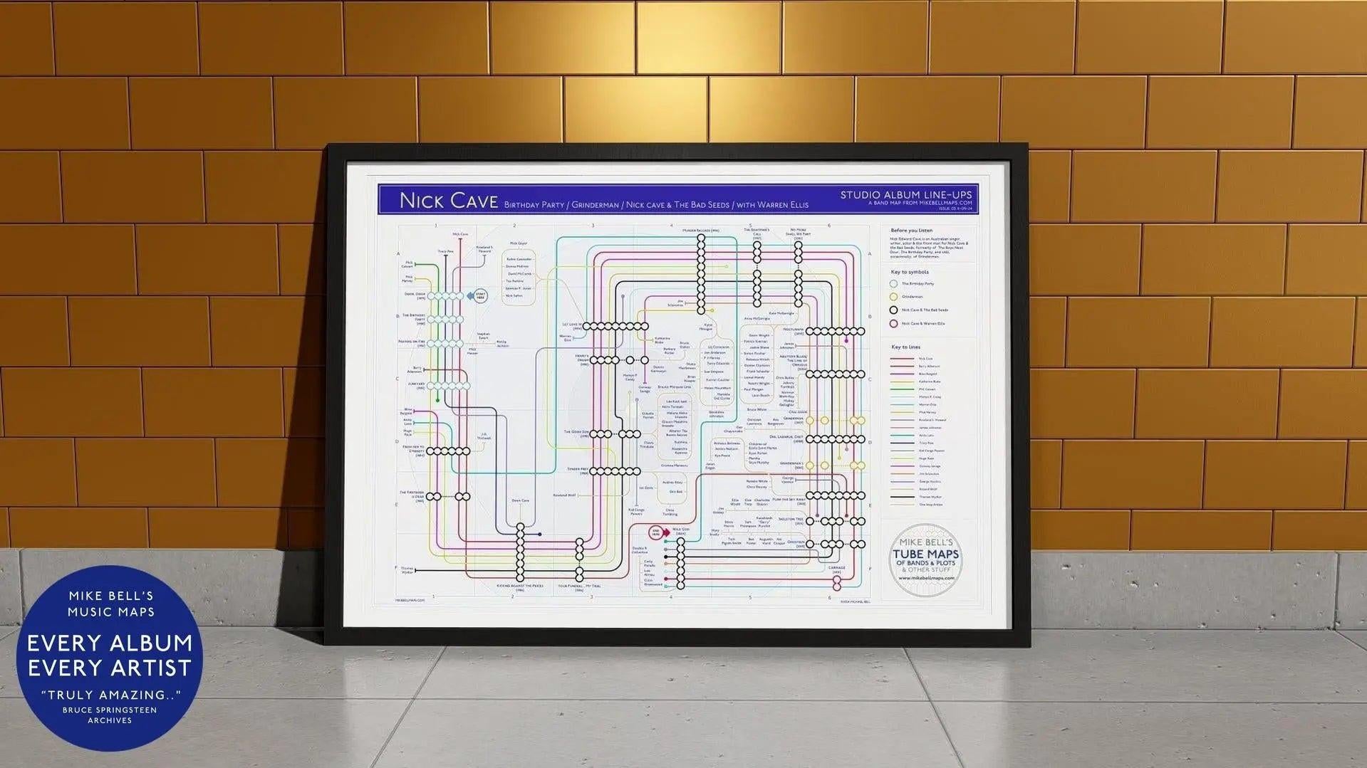 Nick Cave discography map wall art print in a black A1 landscape frame, hung on a feature wall, showing every studio album in order from The Birthday Party through the Bad Seeds and Grinderman, designed by Mike Bell at mikebellmaps.com.