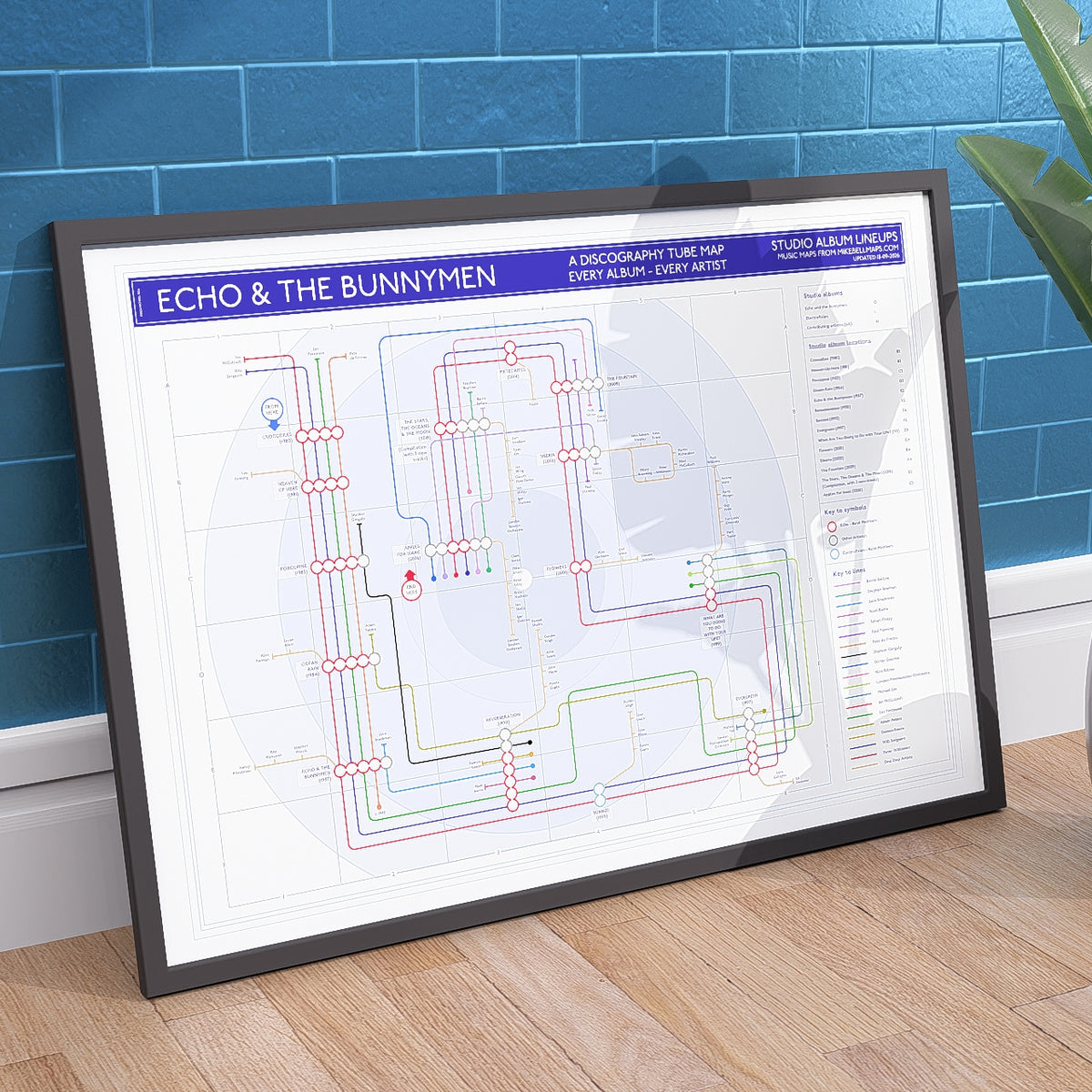 Gift for Echo and the Bunnymen fans - A1 landscape albums in order music map, framed, shown at an angle to the wall.