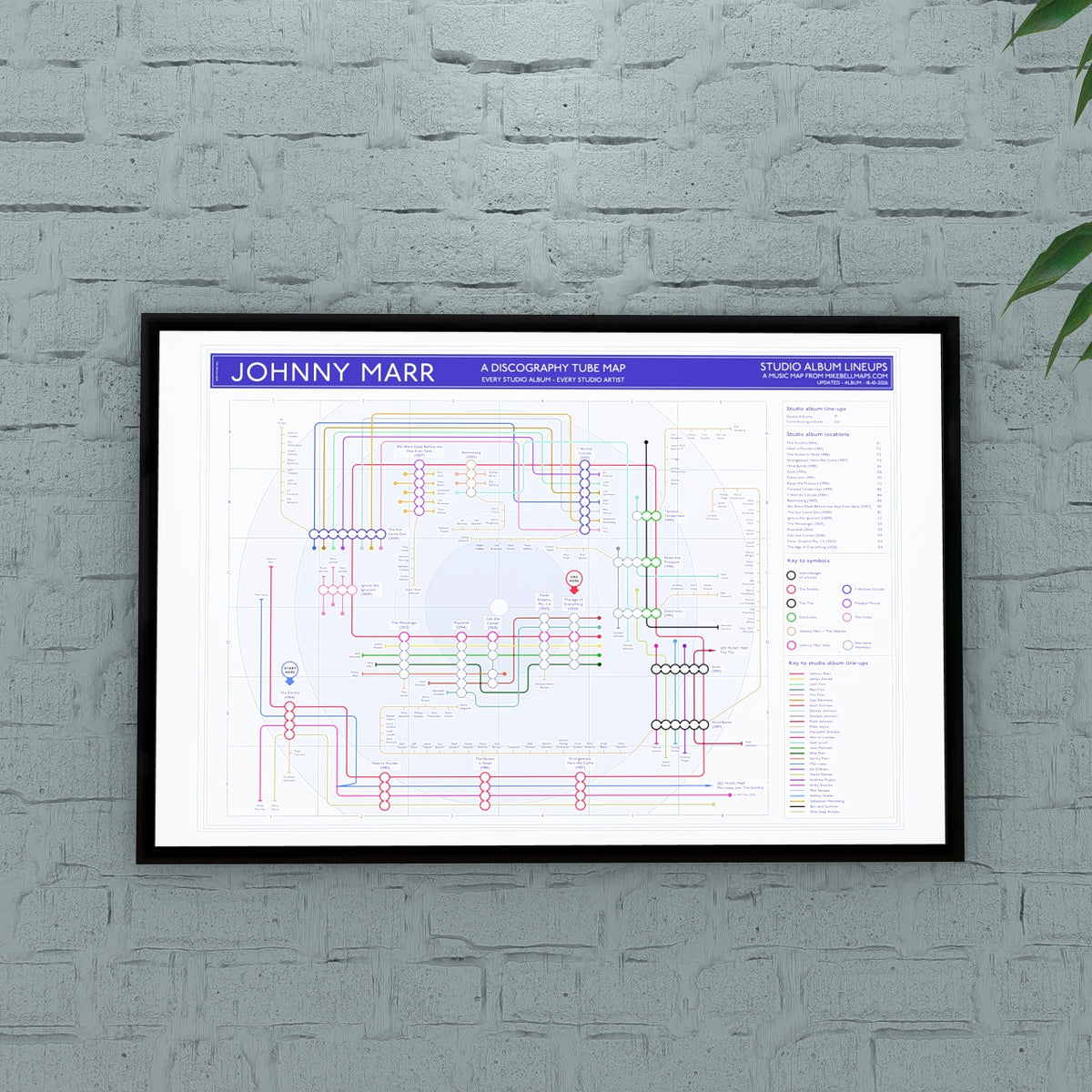 Johnny Marr discography map in 36x24in, framed Giclée wall art print hung on a wall, showing the Smiths, Electronic, The The and solo lines, designed by Mike Bell.