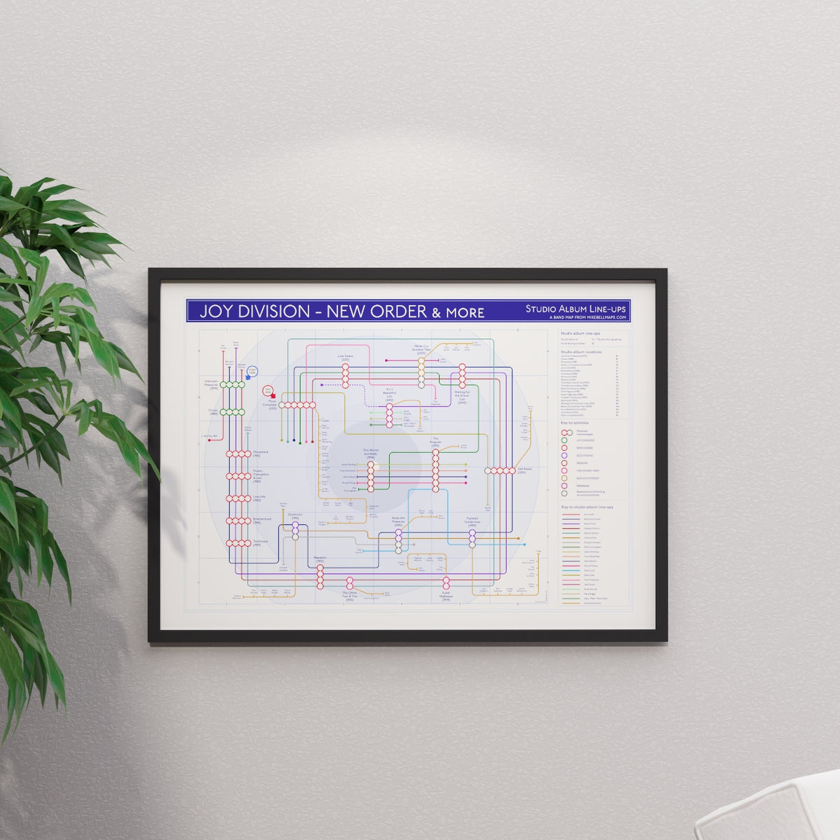 Joy Division and New Order combined discography tube map in A1 size, framed Giclée wall art print in a handmade Italian solid wood frame by Mike Bell.