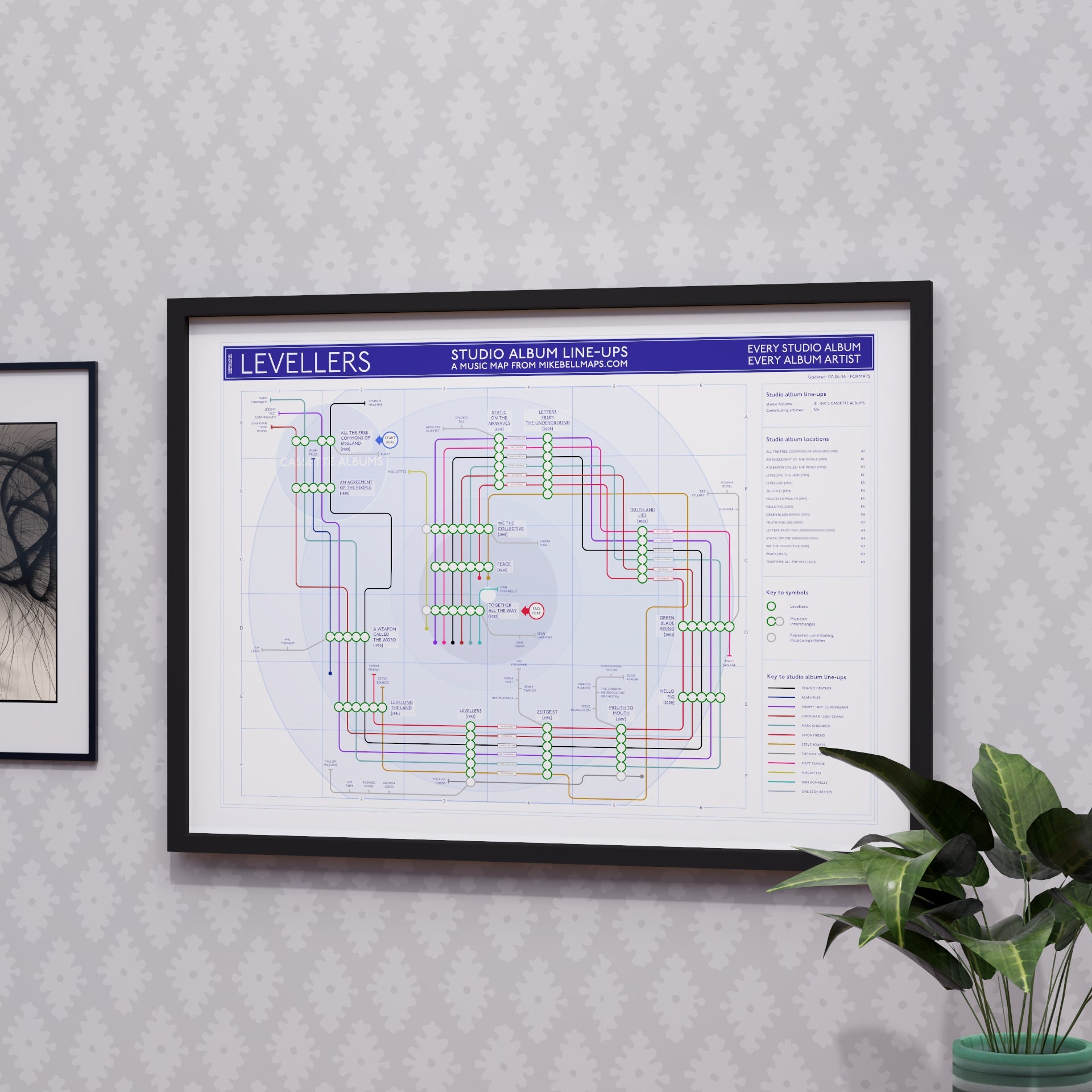 The Levellers discography tube map in A2 size, framed Giclée wall art print in black handmade Italian solid wood frame by Mike Bell.