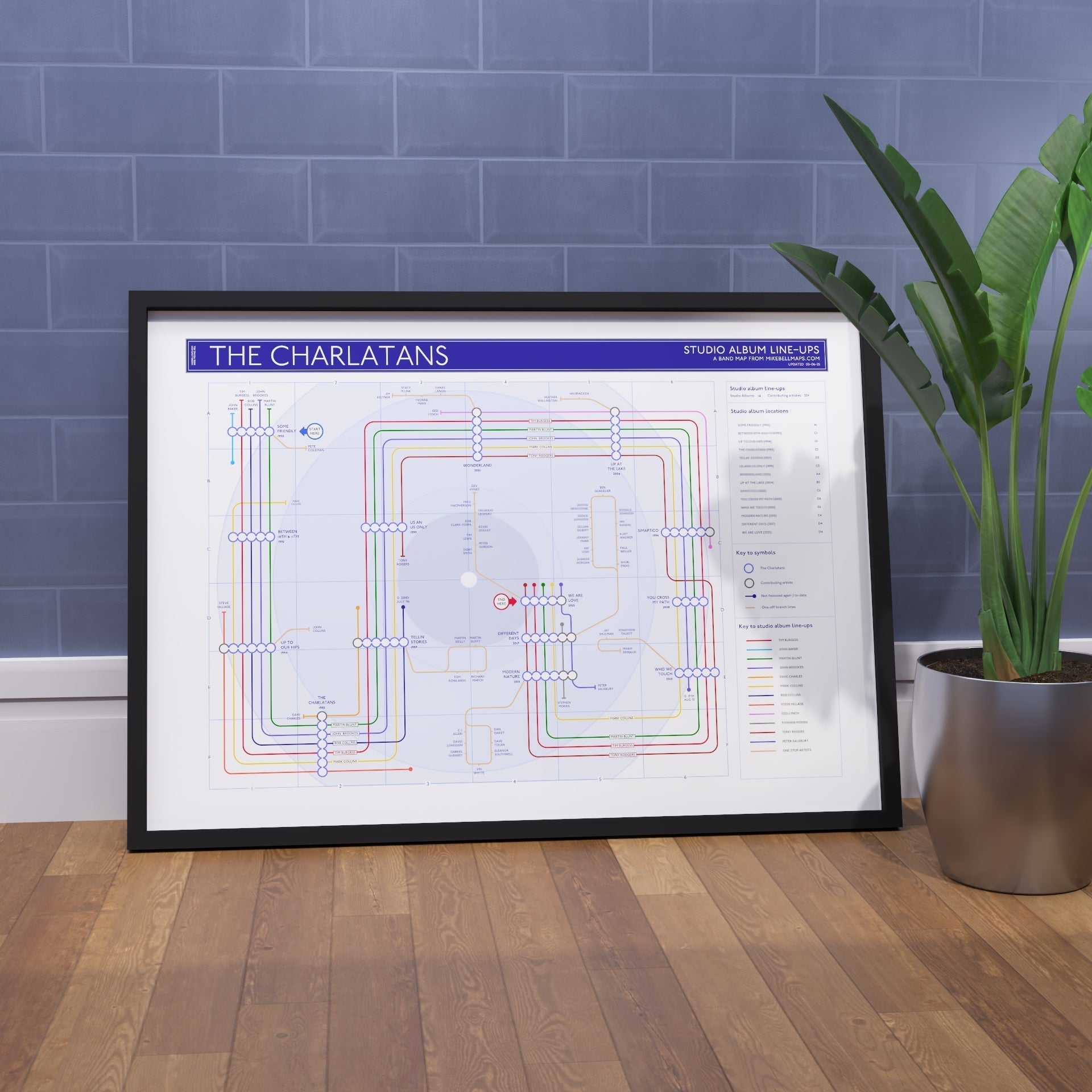The Charlatans discography tube map art print framed in A1 on a feature wall, showing every studio album as a station and every credited musician as a named line, designed by Mike Bell.