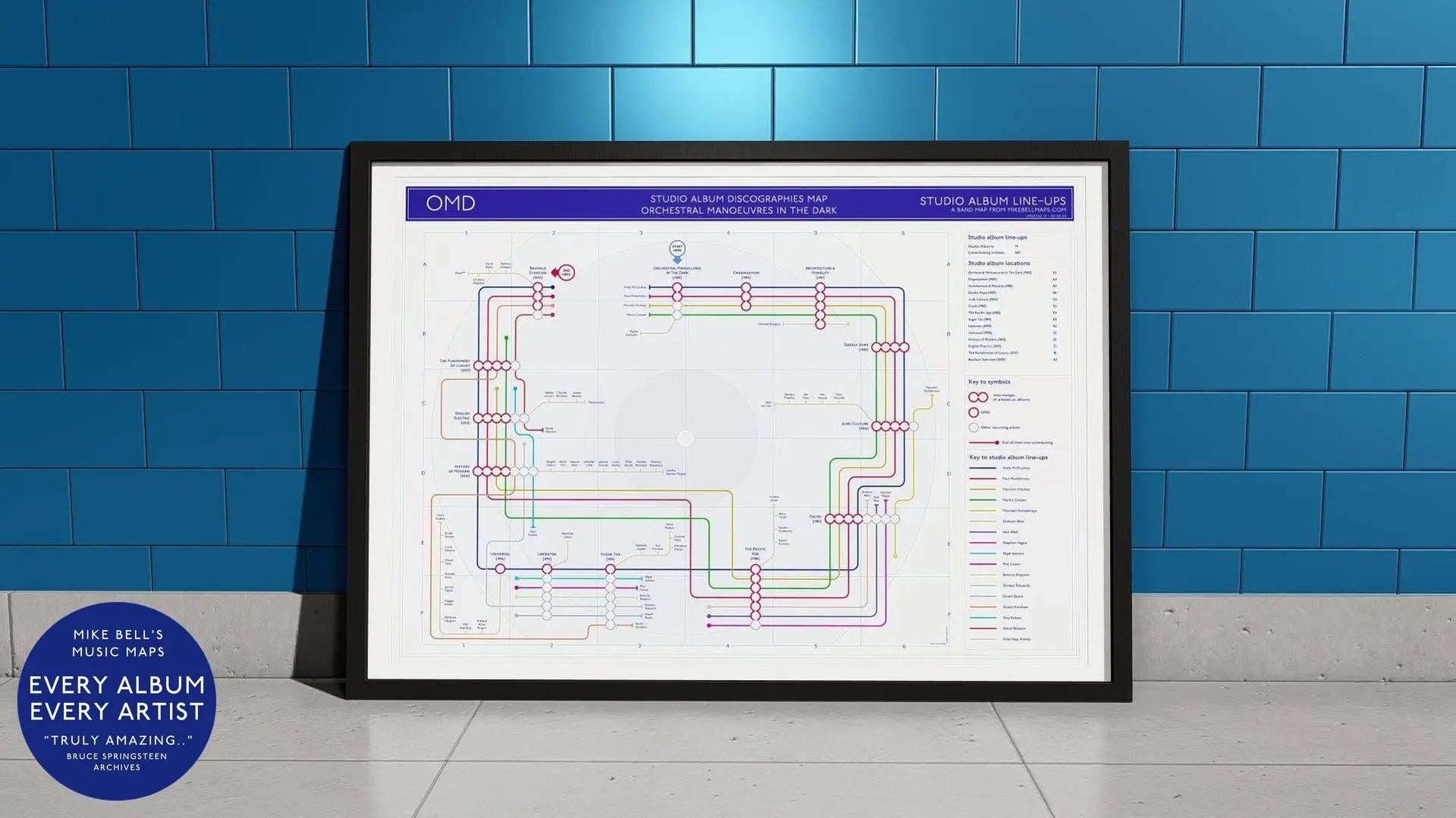 OMD Music Maps unique art print, featuring album and song titles arranged geographically on a map, available framed or as a giclée print.