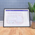 Ideal gift for Radiohead fans - A1 framed Giclée discography tube map leaning against a wall, showing every studio album in order from Pablo Honey (1993) to A Moon Shaped Pool, designed by Mike Bell at mikebellmaps.com.