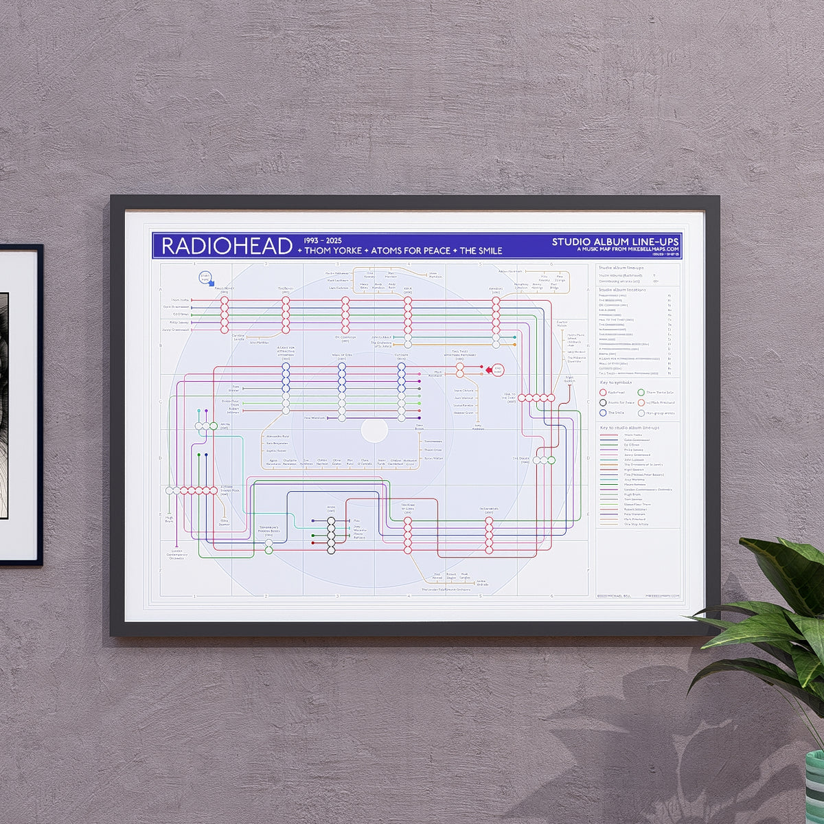 Radiohead discography tube map in A2 size, framed Giclée wall art print in a black wooden frame, with every studio album plotted as a station on the line, designed by Mike Bell.