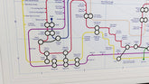 Art print of "The Shining" film plot lines and characters as a tube map, showing scenes as stations and characters as transit lines.