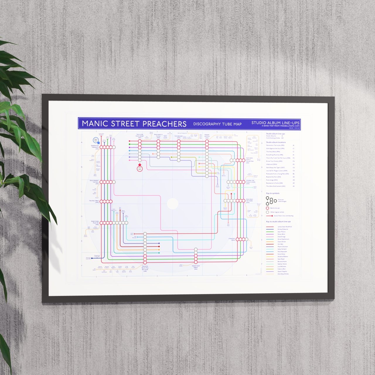 Ideal gift for Manic Street Preachers fans - A1 framed Giclée discography tube map hung on a wall, designed by Mike Bell.
