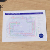 Arctic Monkeys discography map displayed in a setting, framed wall art print against a wall, from Mike Bell&