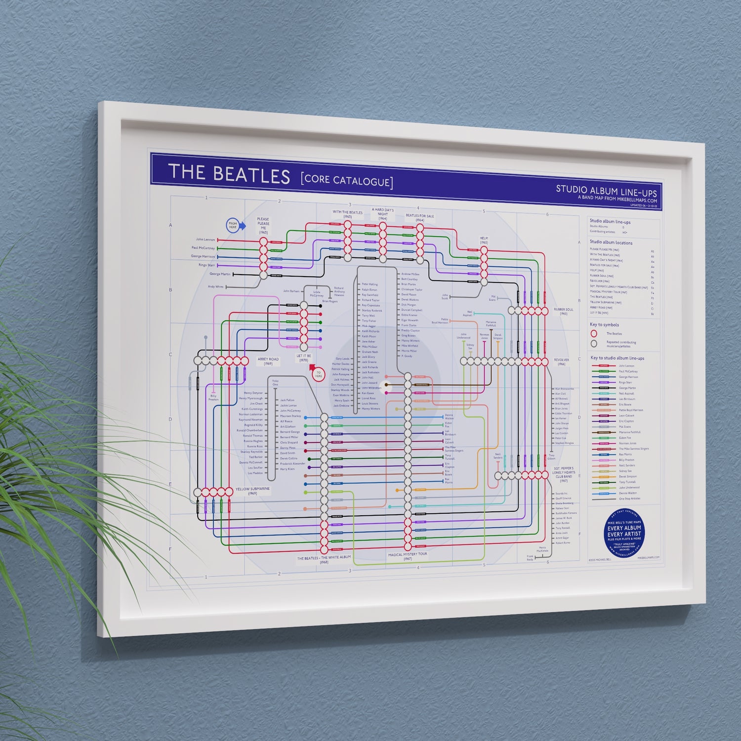 The Beatles discography map shown framed in two sizes, landscape Giclée wall art print by Mike Bell.