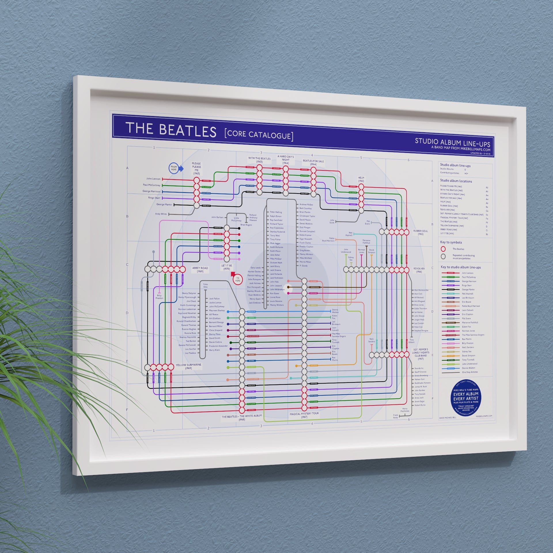The Beatles discography map shown framed in two sizes, landscape Giclée wall art print by Mike Bell.