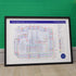The Beatles discography map framed and leaning against a wall, landscape Giclée wall art print by Mike Bell.