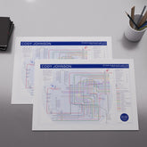 Two posters of Cody Johnson album and EP line-ups on a gray surface with a cup of pens.