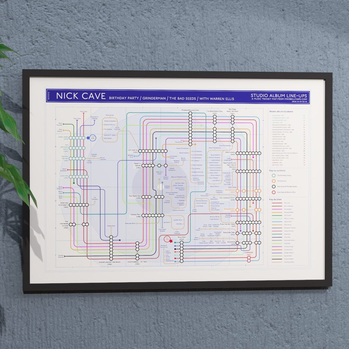 Nick Cave discography tube map in A1, framed Giclée wall art print hung on a wall, showing every studio album from Door, Door (1979) to Wild God (2024) across The Boys Next Door, The Birthday Party, the Bad Seeds and Grinderman, designed by Mike Bell.