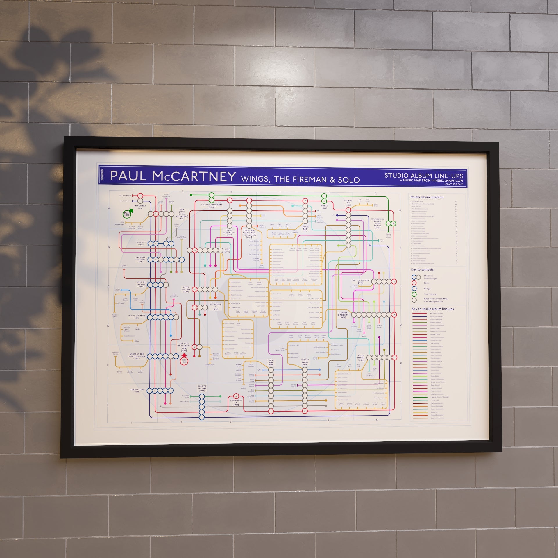 Paul McCartney discography map in A1 size, framed Giclée wall art print in black handmade Italian solid wood frame by Mike Bell.