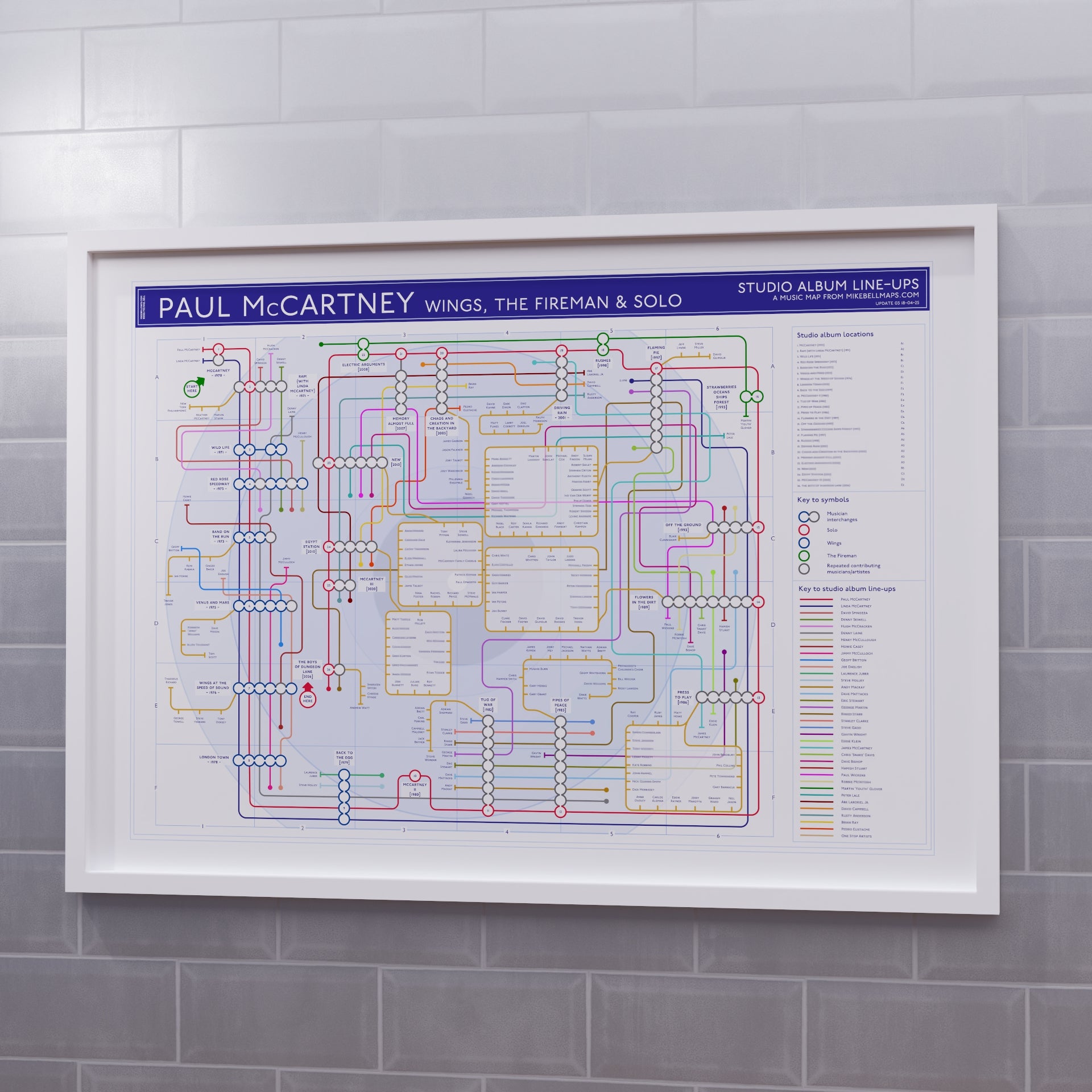 Paul McCartney discography map in A1 size, framed Giclée wall art print in white handmade Italian solid wood frame by Mike Bell.