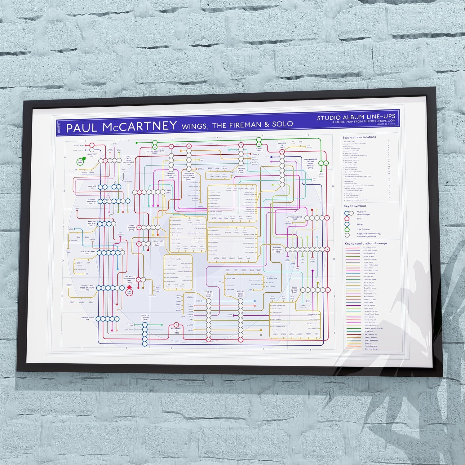 Paul McCartney and Wings discography map in 36x24in, framed Giclée wall art print of the full solo and Wings catalogue, designed by Mike Bell.