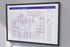Rolling Stones discography map wall art print in a black A1 landscape frame, hung on a feature wall, showing every studio album in order, designed by Mike Bell at mikebellmaps.com.