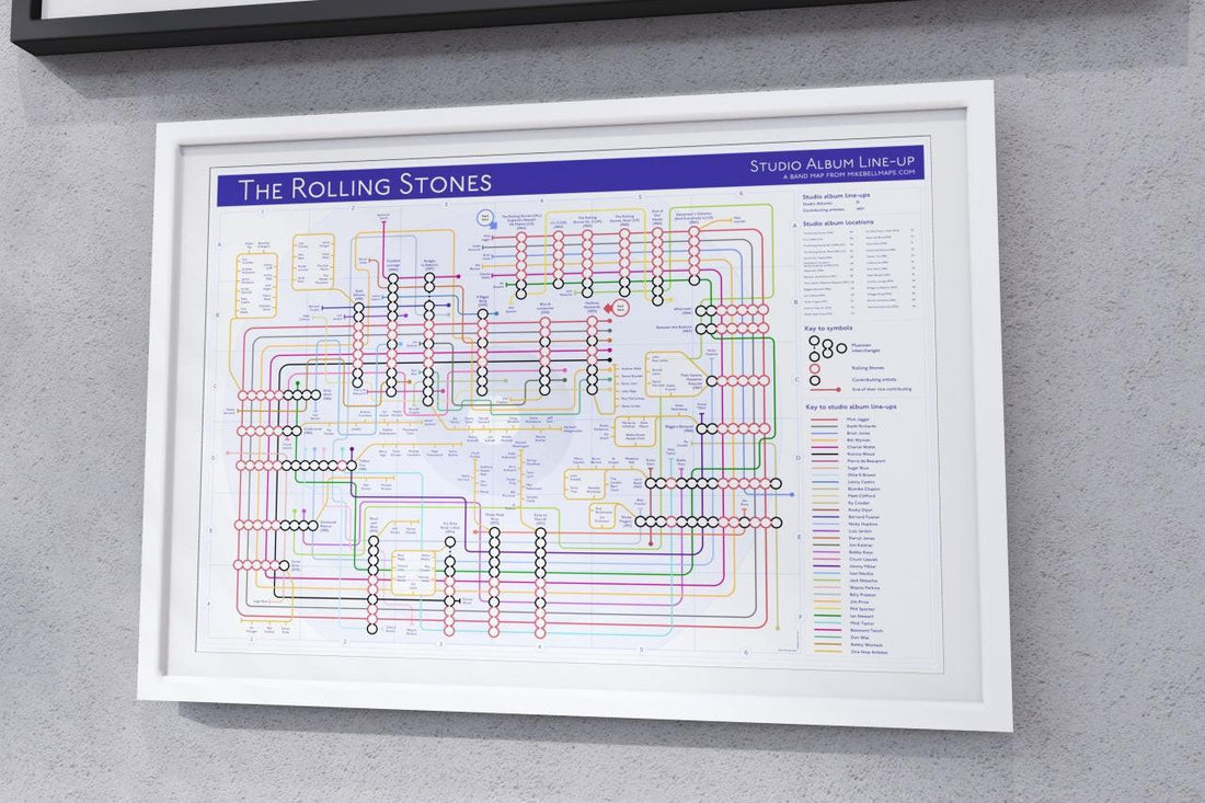 Rolling Stones albums in order music map in a black A2 landscape frame against a white interior wall, wall art print from Mike Bell&